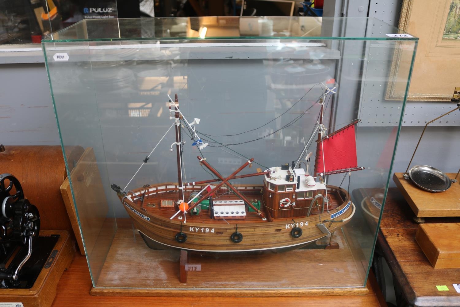 Large Scratch Built Fishing boat entitled Lady Pamela KY194 within glazed case. 60cm in Length
