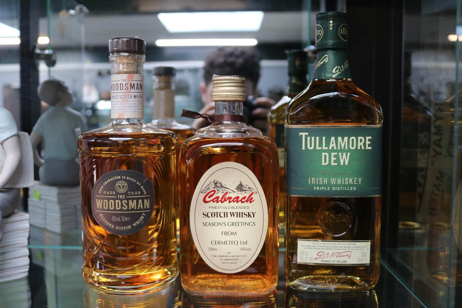 3 Whiskies to include The Woodsman blended Scotch Whisky 70cl, Cabrach 700ml & Tullamore Dew Irish
