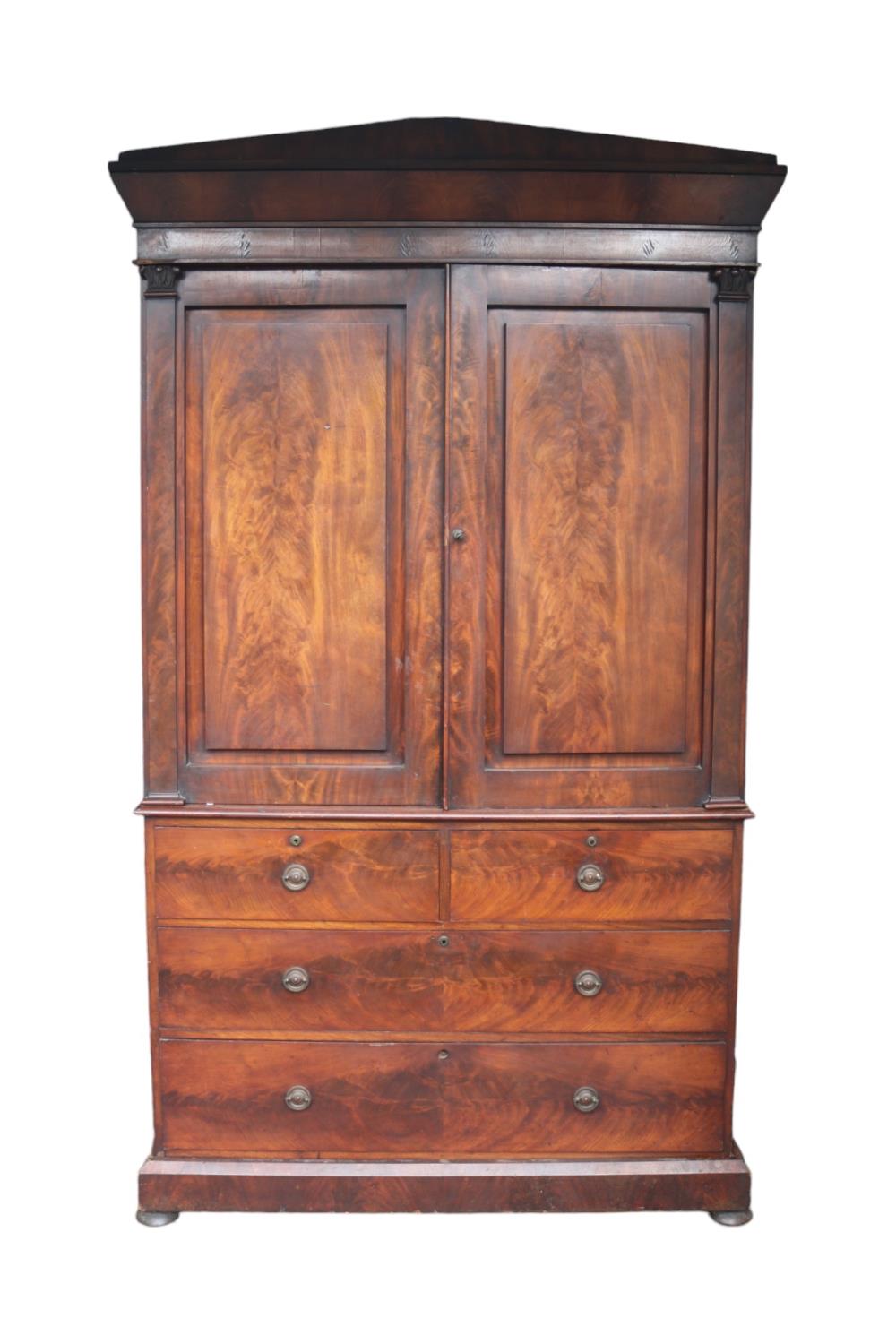 William IV Flame Mahogany fronted Linen press with panelled doors over 4 drawers with brass