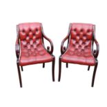 Pair of 20thC Chesterfield Button back Red Leather studded Elbow chairs with scroll arms