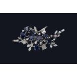 18ct White Gold 1970s Style Sapphire and Diamond set Floral spray brooch. 50mm x 30mm. 9.1gtotal