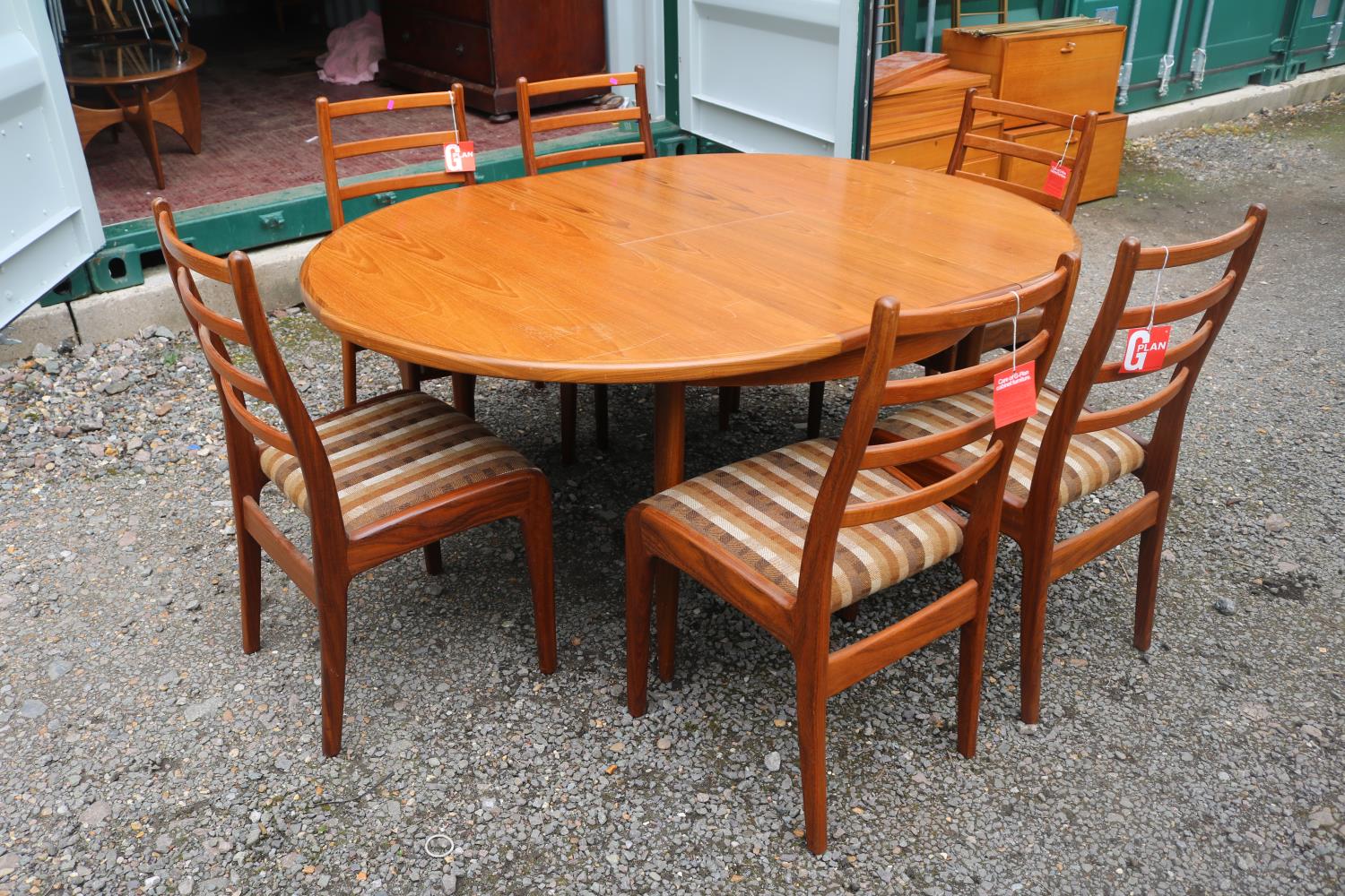 G-Plan Mid Century Oval dining table with cantilever leaf and 6 Matching Chairs with paper labels. - Image 2 of 3