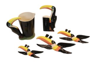 Collection of Guinness Carlton ware to include a set of Graduated Flying Toucans, Toucan Bar Jug and