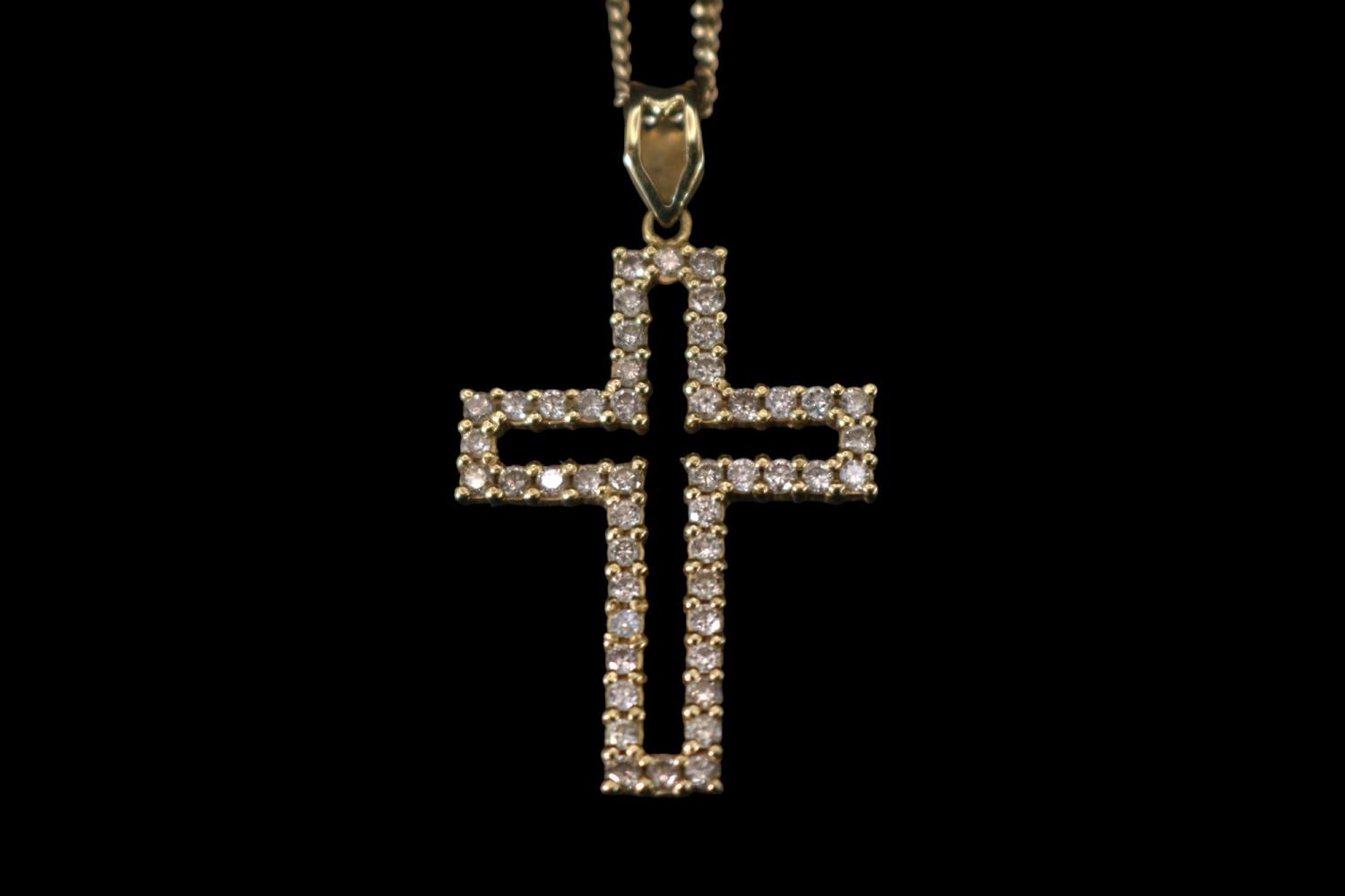 18ct Gold Diamond Claw set Cross on chain 1.00ct total. 42cm in Length. 7g total weight