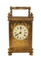 Late 19thC Brass Carriage clock with floral Fretwork front Roman numeral Dial. 150mm in Height