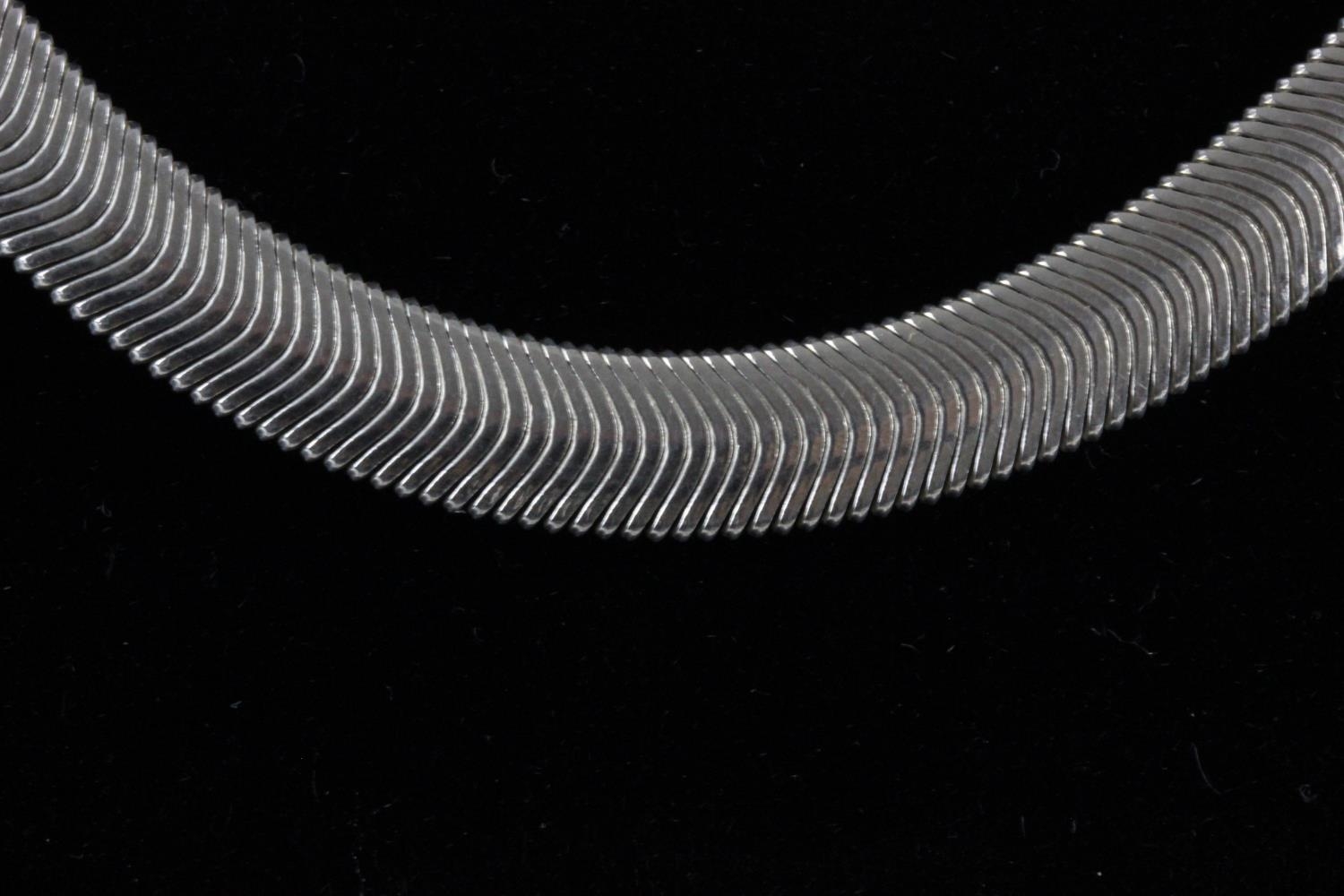 Solid silver herringbone design necklace 8mm wide, weighs 43.4gms with lobster clasp. - Image 2 of 3