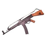 A Denix Reproduction metal AK47 with magazine and box - missing wooden handle grip