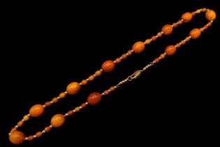 Ladies Amber and 9ct gold beaded necklace. 48 Oval Amber beads 3mm to 8mm with 9ct gold beads