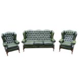 Green Leather Chesterfield Wing arm sofa suite comprising of 3 seater sofa and matching armchairs on