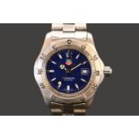 Tag Heuer Professional 200m ladies Swiss quartz watch with date window and blue dial. 30mm case