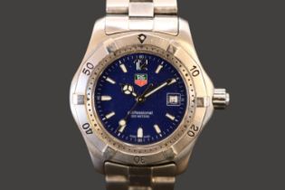 Tag Heuer Professional 200m ladies Swiss quartz watch with date window and blue dial. 30mm case