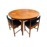 Mid Century A.H. McIntosh & Co of Kirkcaldy Scotland Extending Dining table with 4 Space Saver