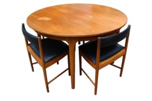 Mid Century A.H. McIntosh & Co of Kirkcaldy Scotland Extending Dining table with 4 Space Saver