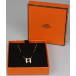 Hermes Pop "H" Necklace Pink. Hermes Pop "H" pendant necklace with pink lacquered enamel H and