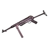 A Denix reproduction metal MP40 Sub Machine Gun with magazine and strap with Y Strap