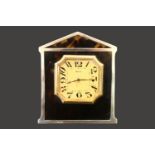 Tortoiseshell Silver mounted 8 Day easel clock with numeral dial Hallmarked London 1924. 10cm in