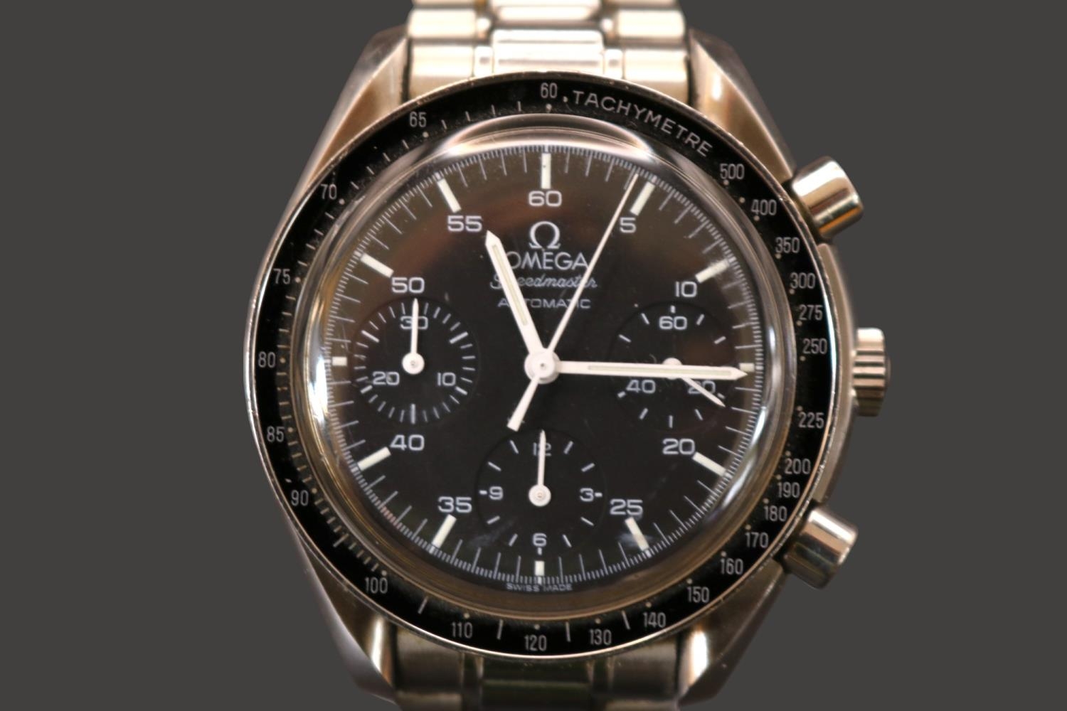 Omega Speedmaster Reduced, 14 jewel automatic Swiss movement. Calibre 3220A. 38mm case size