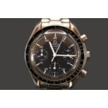 Omega Speedmaster Reduced, 14 jewel automatic Swiss movement. Calibre 3220A. 38mm case size