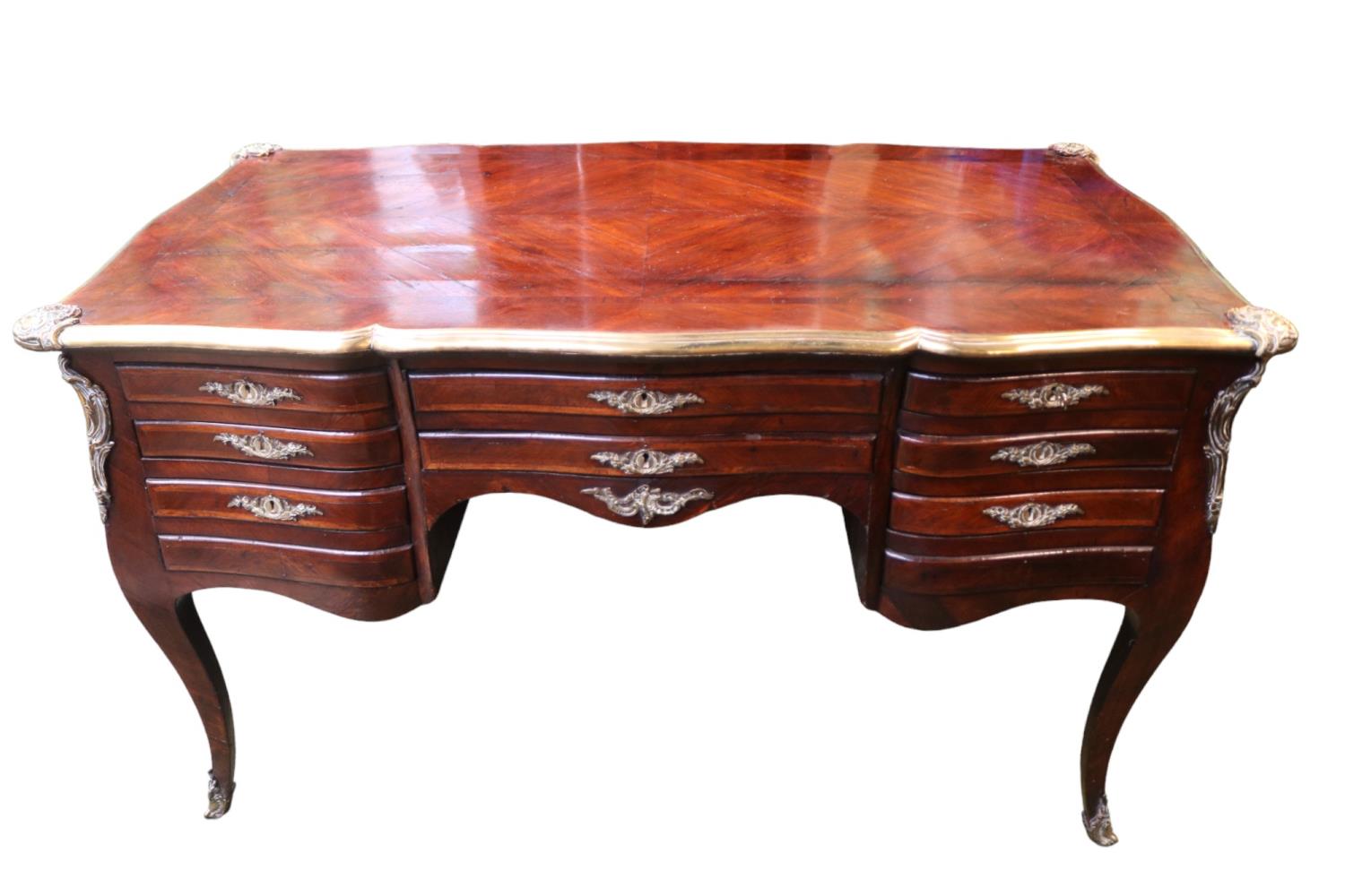 19thC Kingwood Partners Bombe Desk Louis XV Style with applied brass decoration. 134cm in Length