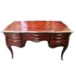 19thC Kingwood Partners Bombe Desk Louis XV Style with applied brass decoration. 134cm in Length
