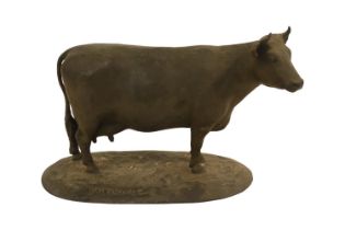 Early 20thC School Bronze Model of a Cow on oval base marked W M Chance. 24cm in Length