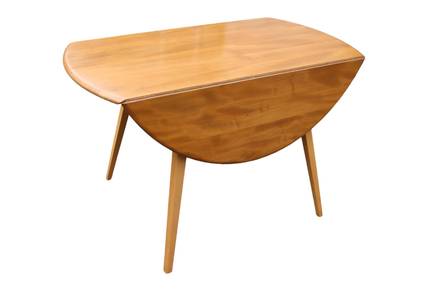 Ercol Blonde Elm Dropleaf Oval dining table on splayed legs. 124cm in Length