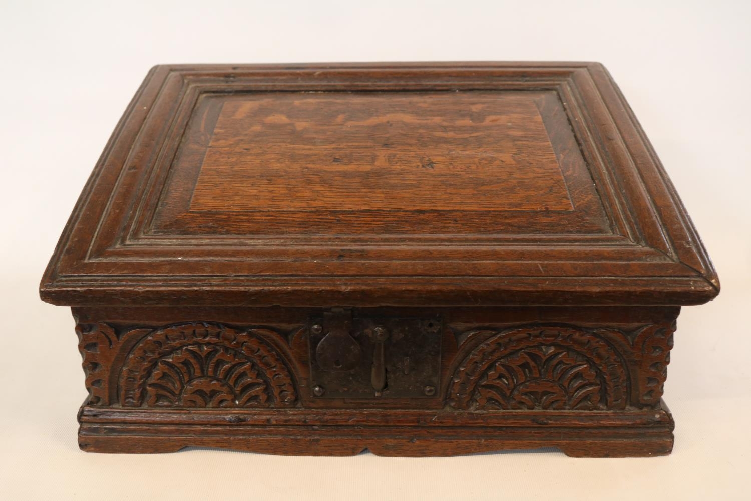 A Georgian oak bible box, early 18th century, the sloped hinged lid above floral guilloche carved - Image 2 of 5