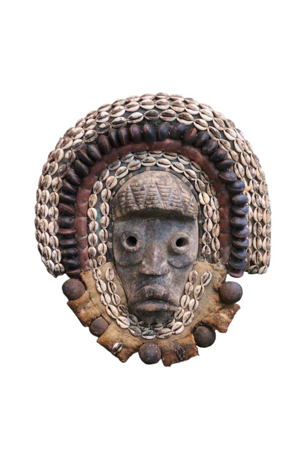African Tribal Mask decorated with Cowrie shells and Nuts possibly Western Africa. 45cm in Height