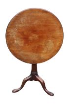 Georgian Mahogany tilt top table with Birdcage pillar support over simple flared stem and tripod