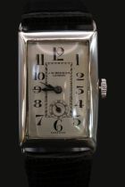 J W Benson of London Swiss Silver rectangular cased wristwatch on Leather strap. 24mm Case