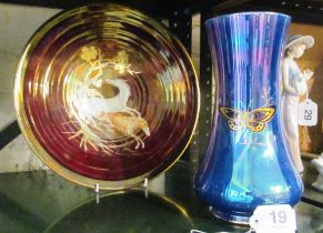 A Crown Devon 1930's lustre 'Pegasus' charger and a blue lustre vase decorated butterflies