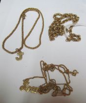 A 9ct gold ropetwist chain, three other chains, two 9ct 'Joan' pendants and a 'J', 30.4g