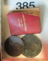 Two George III coins and a miniature Atlas of the British Empire