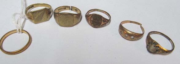 Two 9ct gold signet rings (one cut), 9ct gold wedding band and three other rings