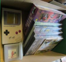 A Nintendo Game Boy model DMG-01, some games and other games