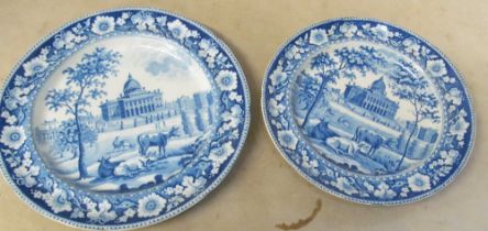 Two Rogers blue and white plates scenes with buildings and cows to foreground