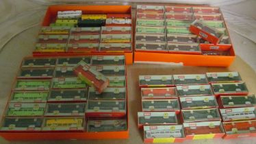 Seventy-one Minix small plastic boxed buses and forty-three unboxed