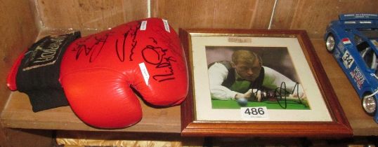 A Warrior signed boxing glove to include; Barry McGuigan, Colin McMillan, Frank Bruno, Nicky Piper