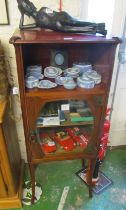 An Edwardian Art Nouveau cabinet on shaped legs