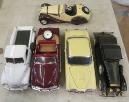 A Mira Chevrolet Pickup, Ford 1949 (wheel loose), Sunstar Vega, a battery operated car and BMW 328