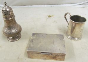 A silver Christening mug, caster and cigarette box