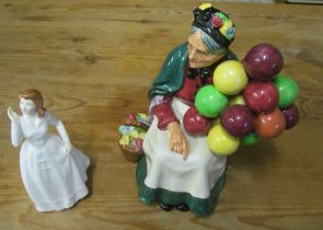A Royal Doulton Balloon Seller and small figure Joy