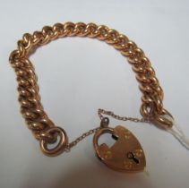 A 15ct curb link bracelet with padlock clasp 35.9g