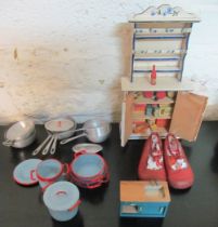 A pair of childs red leather shoes, an Italian dolls house dresser filled with miniature kitchenalia