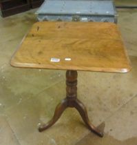 A mahogany pedestal table