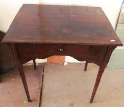 An Edwardian rosewood table with frieze drawer