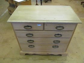A pine chest two short and three long drawers