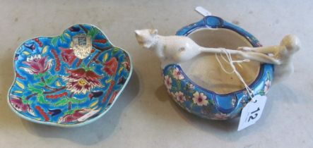 A Longwy enamelled pottery dish and an ashtray/bowl with monkey pulling a cats tail