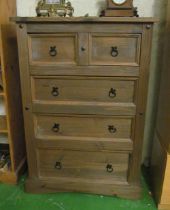 A tall chest drawers two deep drawers and three long deep drawers