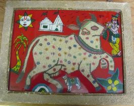 A reverse Indian painting on glass with beaded design of bull